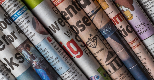 A colourful stack of newspapers